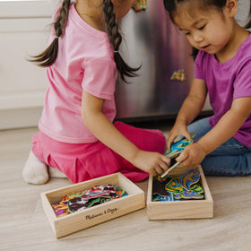 Melissa & Doug magnets set designed for ages 2 and up, with kid-safe wooden pieces.