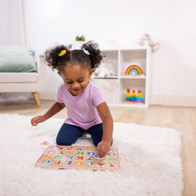 Melissa & Doug wooden puzzle pieces glow with bright colors for engaging learning.
