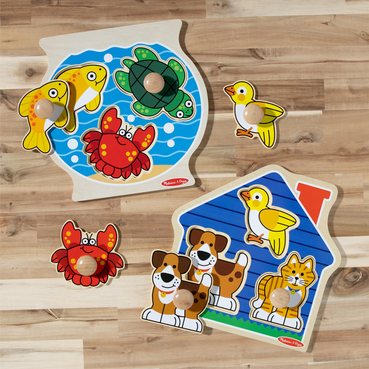 Melissa & Doug wooden puzzles inspire color and shape recognition.