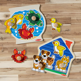 Melissa & Doug wooden puzzles inspire color and shape recognition.