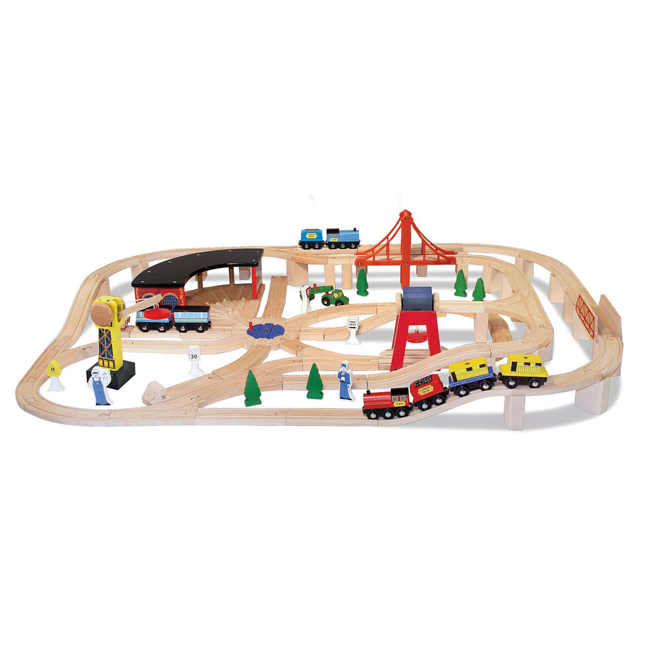 Melissa & Doug Wooden Railway Roundhouse image showing engine shed for imaginative play.