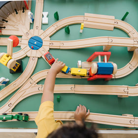 Melissa & Doug Wooden Railway Straight Track provides sturdy paths for routes.