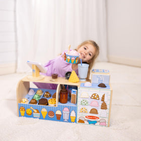 Melissa and Doug wooden scoops for durable, hands-on pretend dessert making.