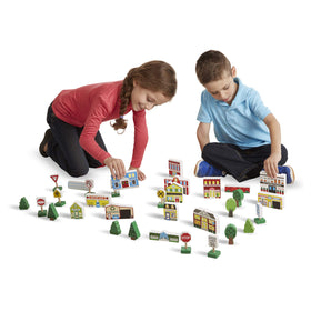 Melissa & Doug wooden town trees and fences add natural separators for block setups.