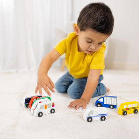 Melissa & Doug wooden town city bus for durable, smooth-handling transit play.
