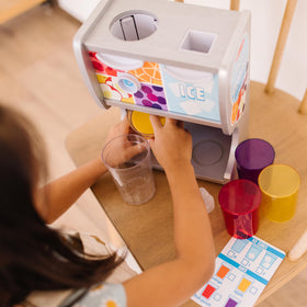 Melissa & Doug wooden toy kitchen accessory complements play sets and kitchens.