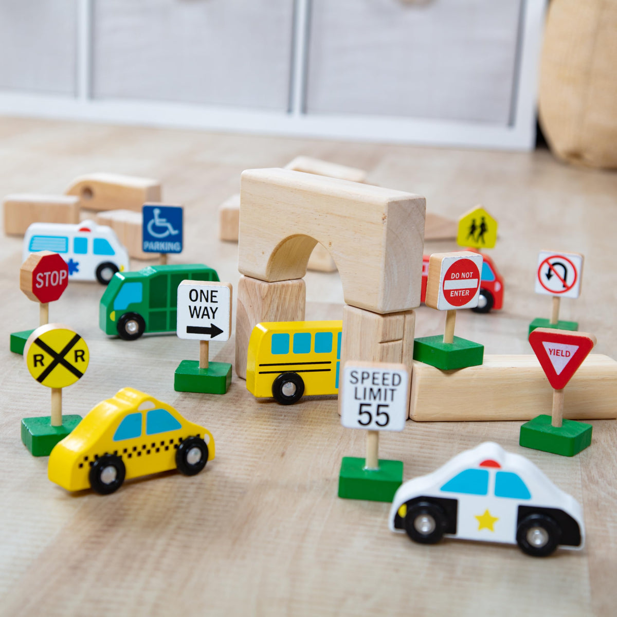 Melissa & Doug wooden school zone sign introduces routing concepts playfully.