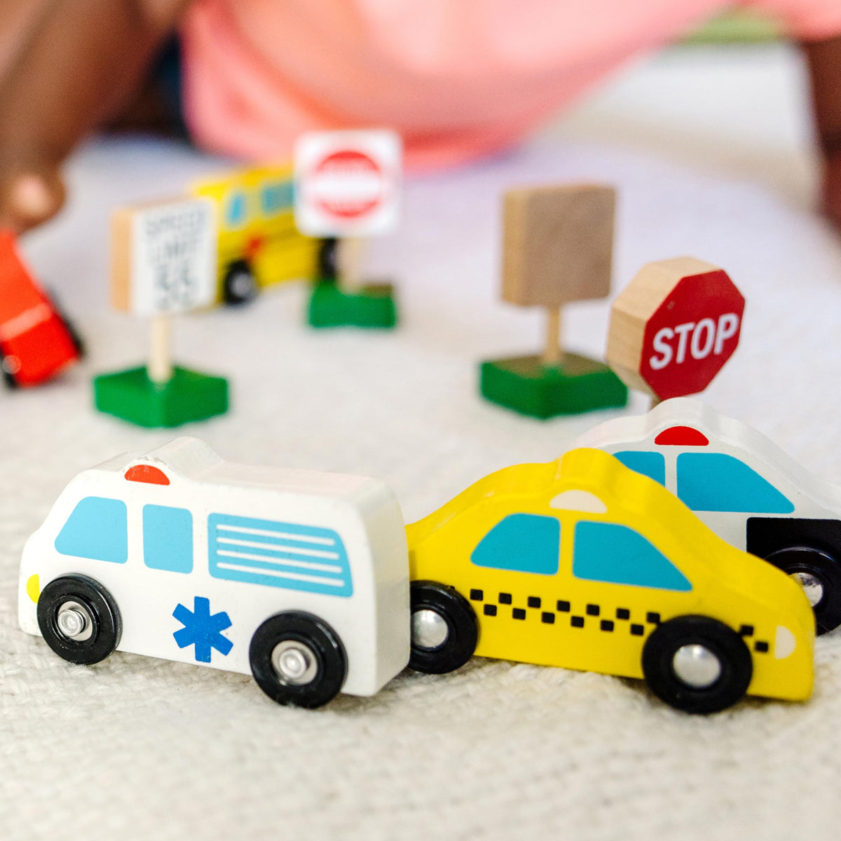 Melissa & Doug wooden stop sign supports safety-themed imaginative play.
