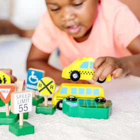 Melissa & Doug wooden yield sign helps teach traffic awareness through play.