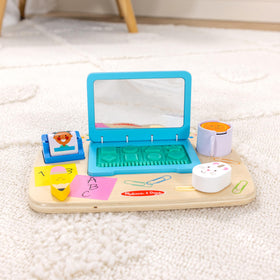 Melissa & Doug board features adorable characters and textures to spark exploratory play.