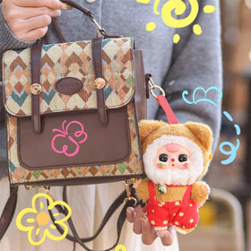 Meokro plush pendant attached to a bag for a cute accessory
