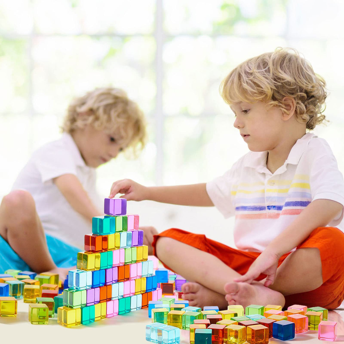 Meooeck colorful cubes cast bright shadows on a sunlit surface