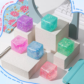 Meooeck green glitter ice cube stress ball promotes calmer study sessions.