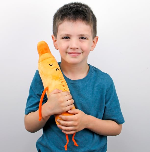 MerryMakers orange plush crayon with beanie bottom, ideal for sit-at-shelf storytelling and play.