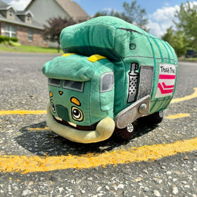 MerryMakers Trash Truck Plush child holding it for role-play storytelling.