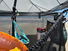 MESH TITAN Canopy-tent mounting between trees for flexible setup.