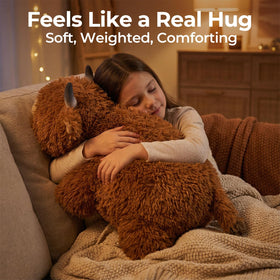 Mewaii weighted cow plush used on a couch for cozy moments
