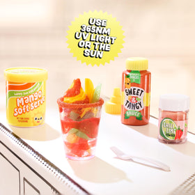 MGA's Miniverse Make It Mini Cafe Series 4 mini desserts set under sunlight to harden resin