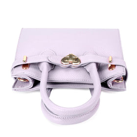 Mibasies purple purse worn as crossbody for adventures
