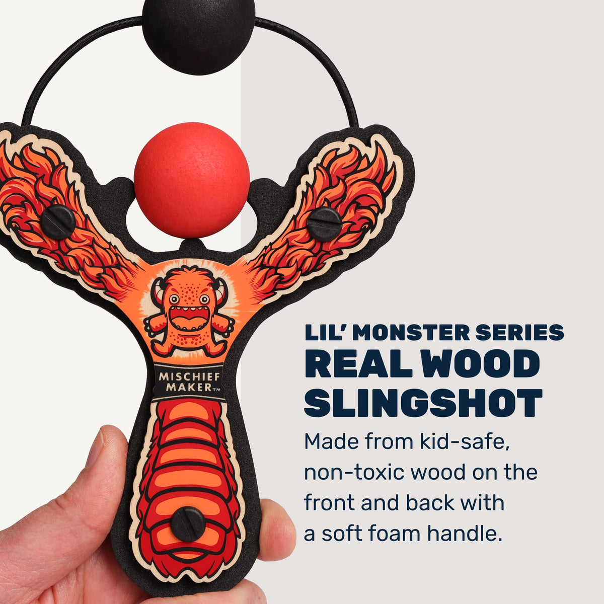 Mighty Fun! Slingshot green side view emphasizes sturdy wood and playful monster motif.