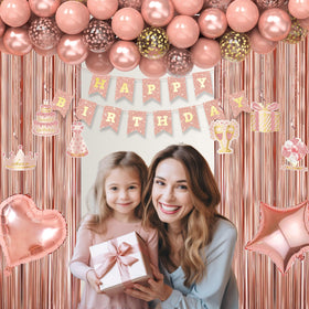 Miidenks rose gold confetti balloons elevate table and arch decorations.
