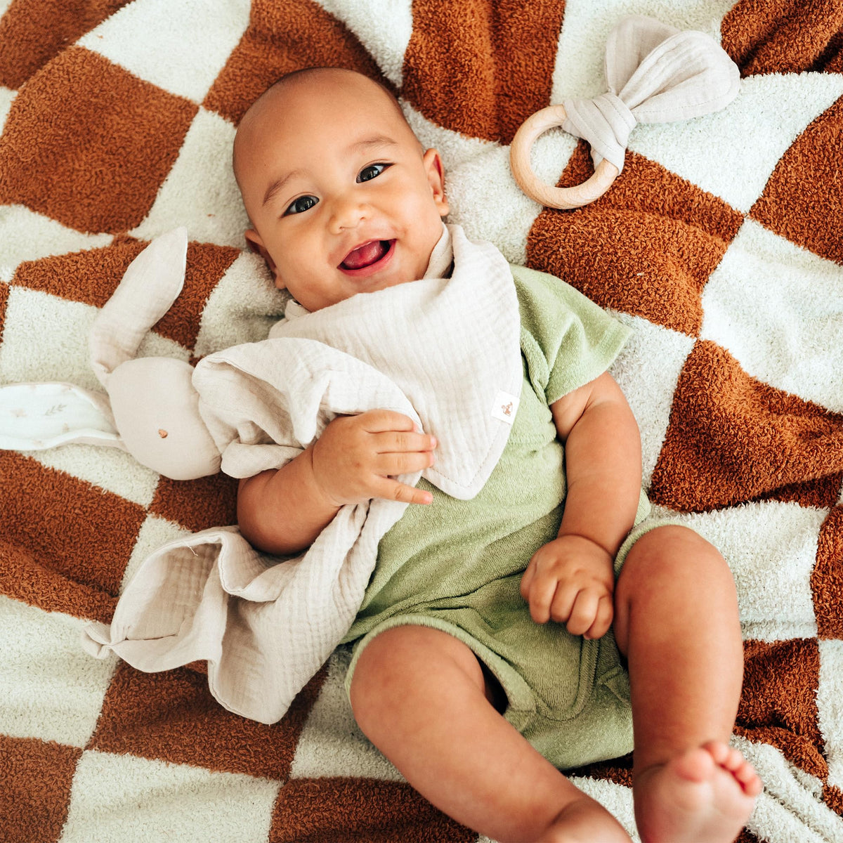 Mikito Organic Cotton Bunny Lovey measures 12x12 inches for easy baby handling.