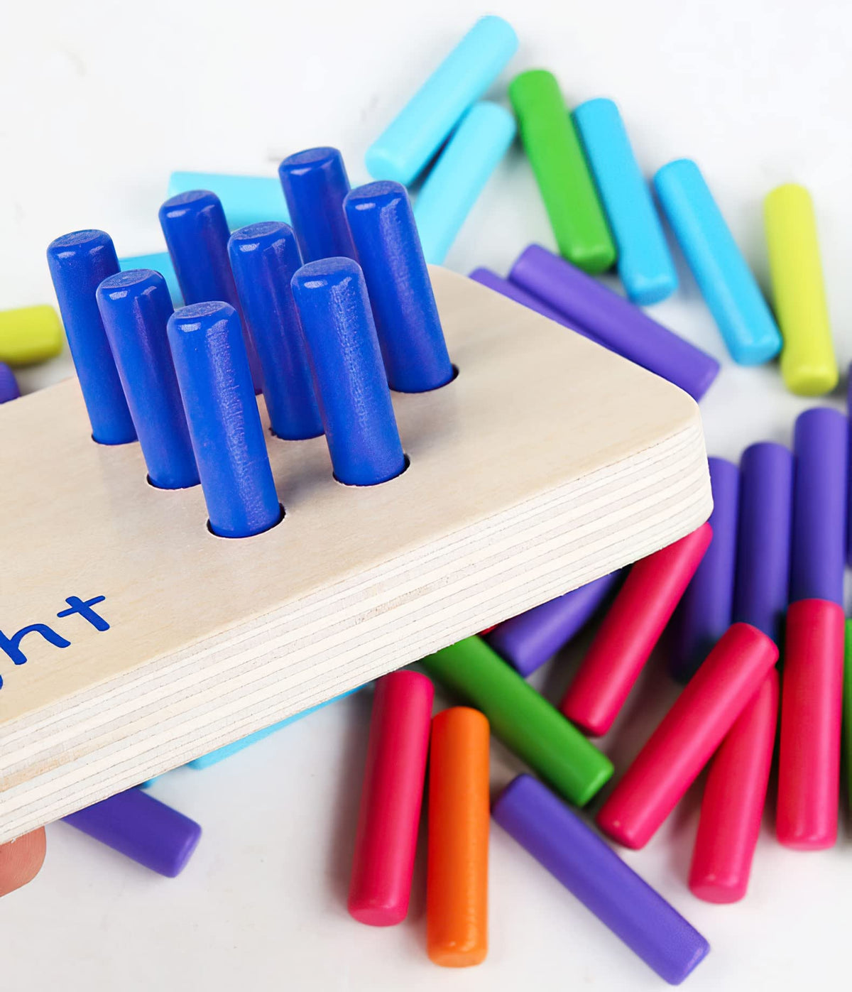 MIKNEKE bright color pegs illustrate numbers by filling holes during hands-on play.