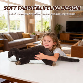 milkcheesepals weighted otter plush on sofa demonstrates warm decorative accent