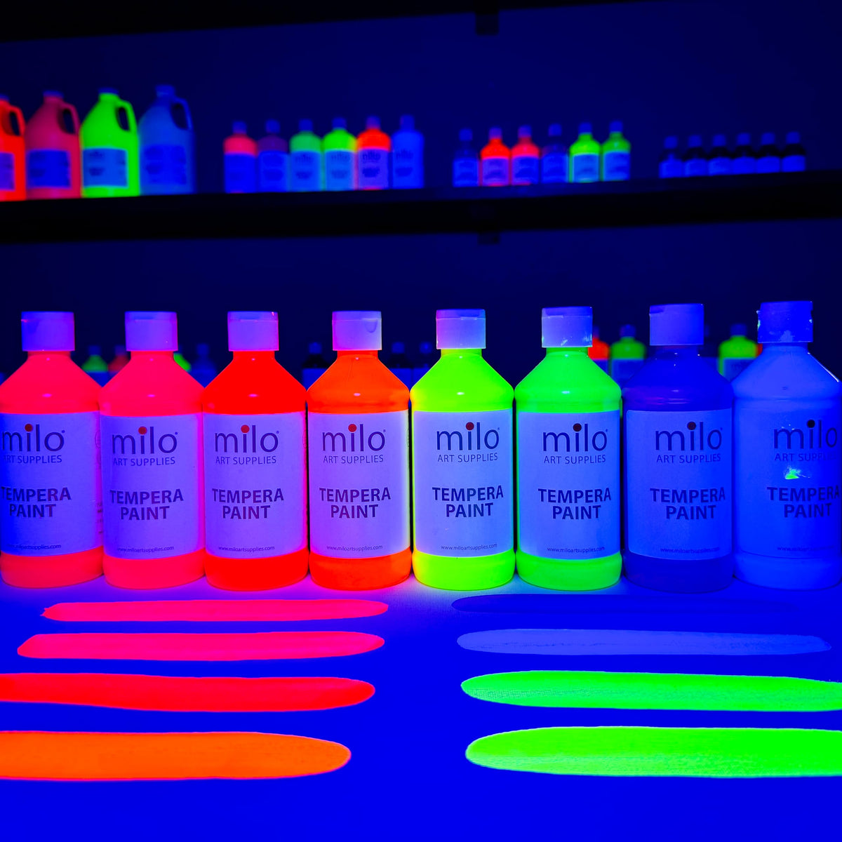 Milo fluorescent blue bottle adds UV-reactive color to windows and boards