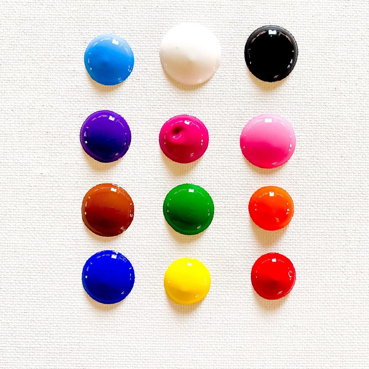 Milo Washable Tempera Paint pink bottle—soft shades for gentle kids' art pieces.