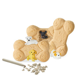 MindWare Dig It Up! puppy reveals during emergence phase for curiosity and storytelling.