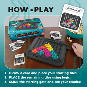 MindWare Marble Circuit Puzzle steel marbles glinting as they roll toward targets.