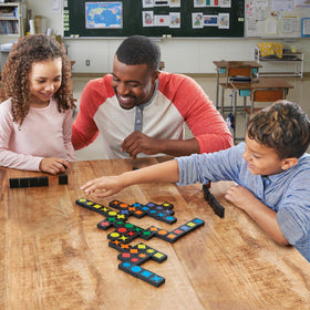 MindWare Qwirkle group play with 2-4 players around a table.