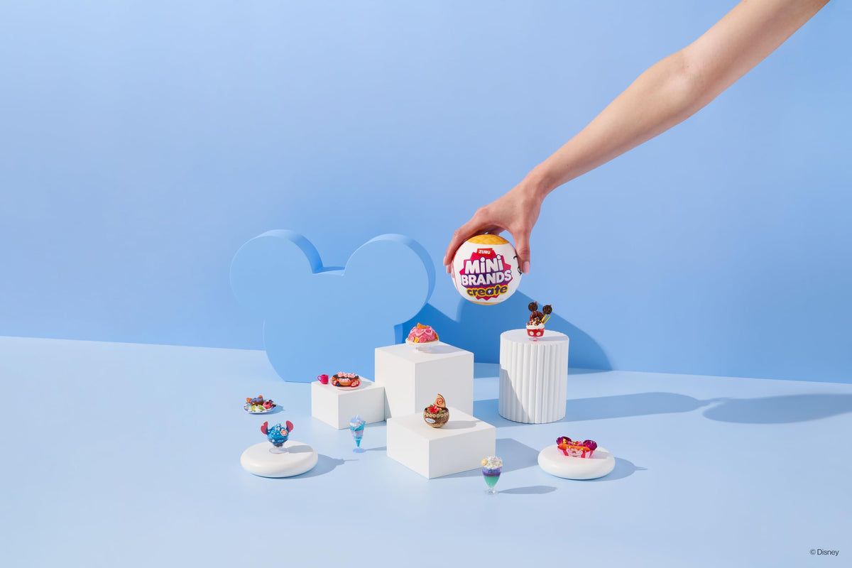 Unboxing packaging of Mini Brands Create Disney Snacks shows a non-edible mystery toy.