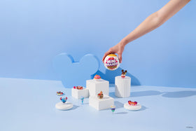 Unboxing packaging of Mini Brands Create Disney Snacks shows a non-edible mystery toy.