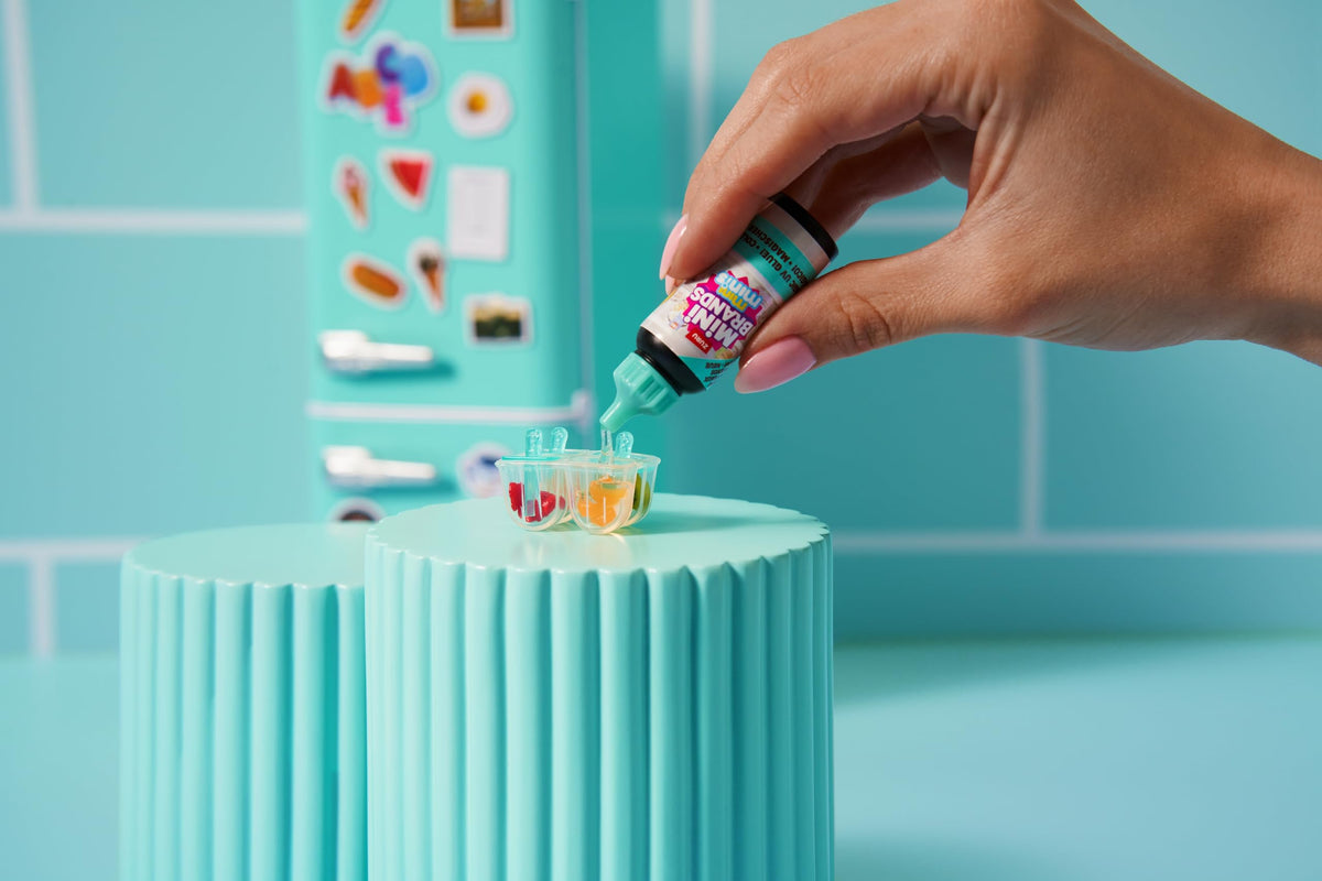 Mini Brands Fill The Fridge mini food items create playful, realistic shelves.