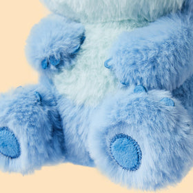 MINISO Stitch plush travel-friendly size fits backpacks for adventures.