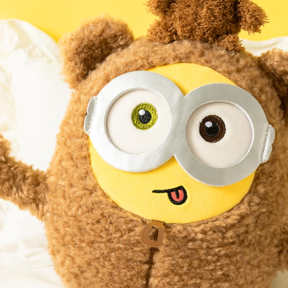 MINISO kawaii Minions pillow plush adds cozy decor to a kid's room.