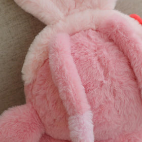 MINISO Lilo & Stitch Angel Bunny plush on shelf for display