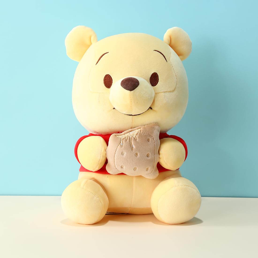 MINISO Winnie-the-Pooh plush decor adds charm to beds and shelves.