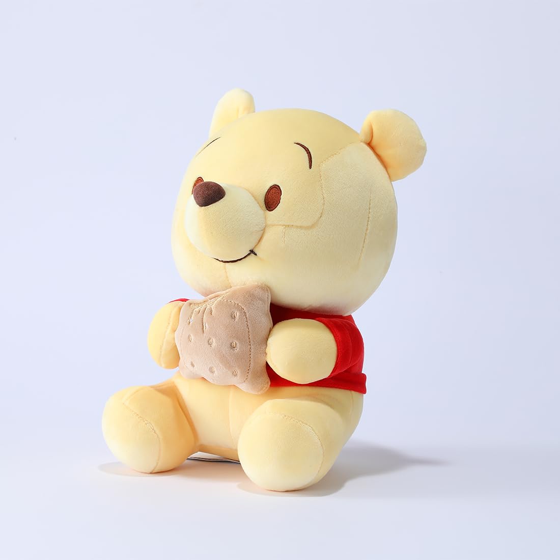 MINISO Winnie-the-Pooh plush brightens any room when displayed.