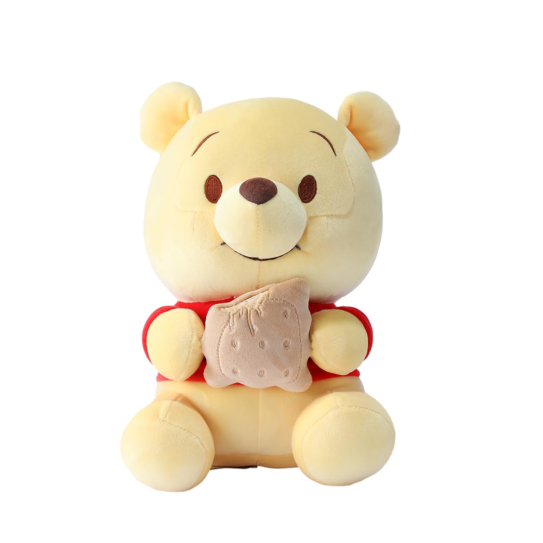 MINISO Winnie-the-Pooh plush sits with biscuits for cozy bedtime moments.