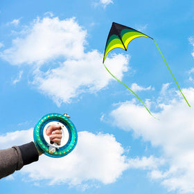 Bright delta kite by Mint's Colorful Life visible in the sky for family flying