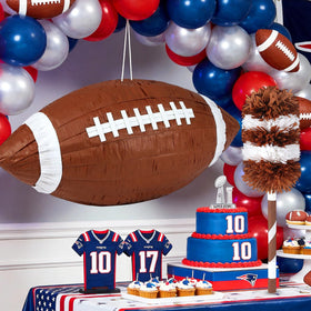 Mionyl football pinata with blindfold and bat for quick party games.