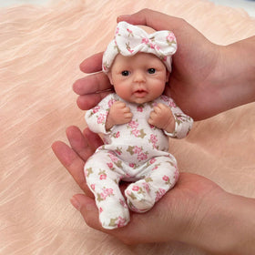 Mire & Mire Reborn 7inch full-body silicone doll highlighting soft, skin-like texture