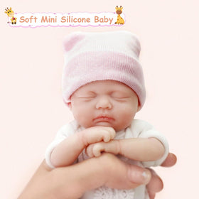 Mire & Mire Reborn baby bottle image showing feeding play and caregiver role modeling