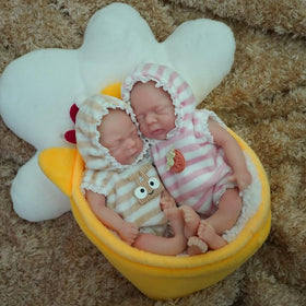 Mire and Mire twin reborn doll face detail showing lifelike features for collectors