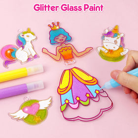 Mocoosy suction cups for windows help display art after painting.