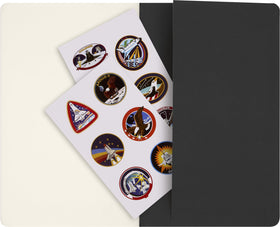 Moleskine NASA Cahier opens flat for effortless writing.