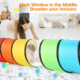 Children exploring and crawling through colorful tunnel passages